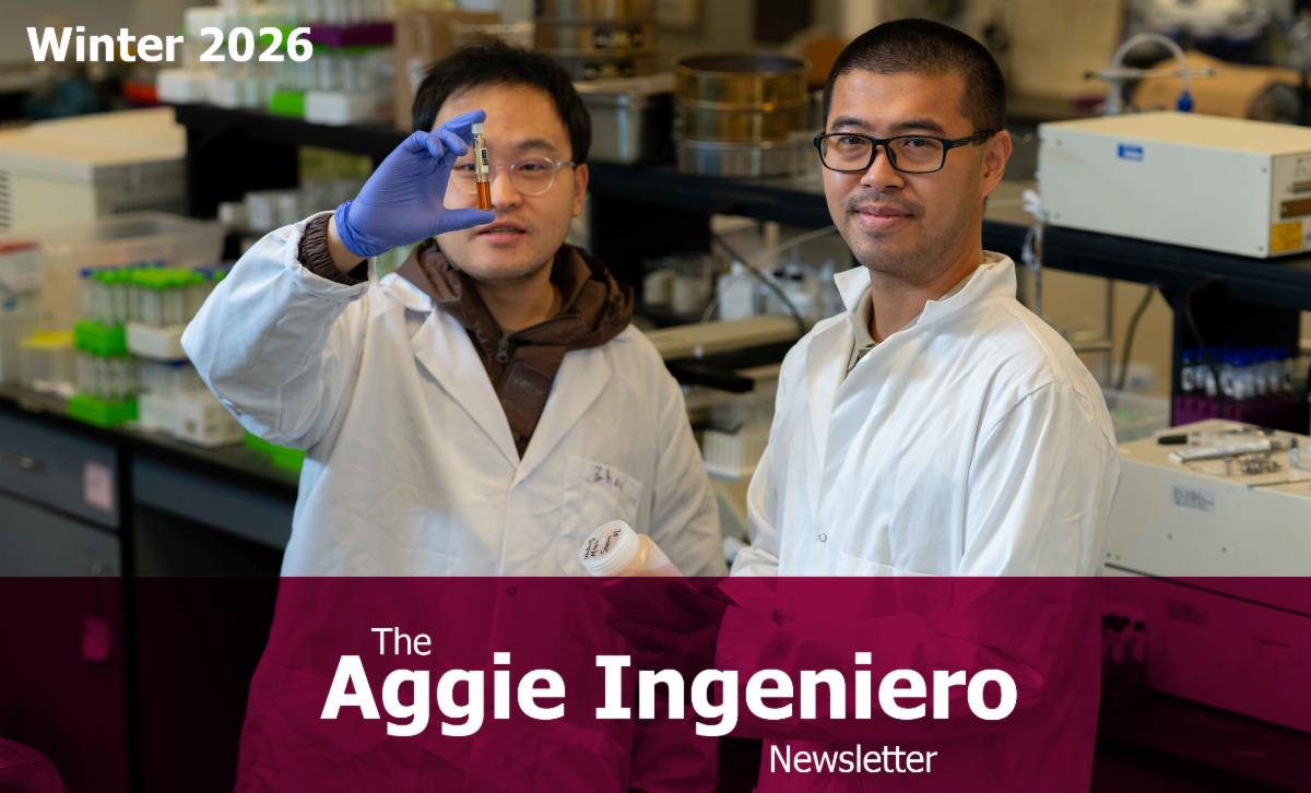 Spring 2026 Two young college guys in white lab coats in a lab